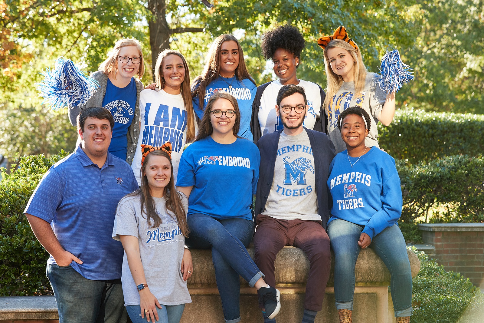 Students with poms and school spirit on campus