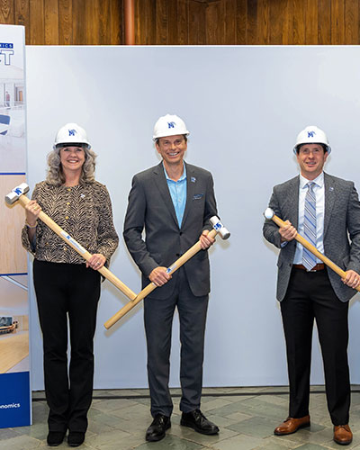Dr. Tara Jones, (left); President Bill Hardgrave, Dean Bobby Garrett