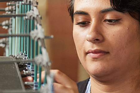 student studying in dorm housing