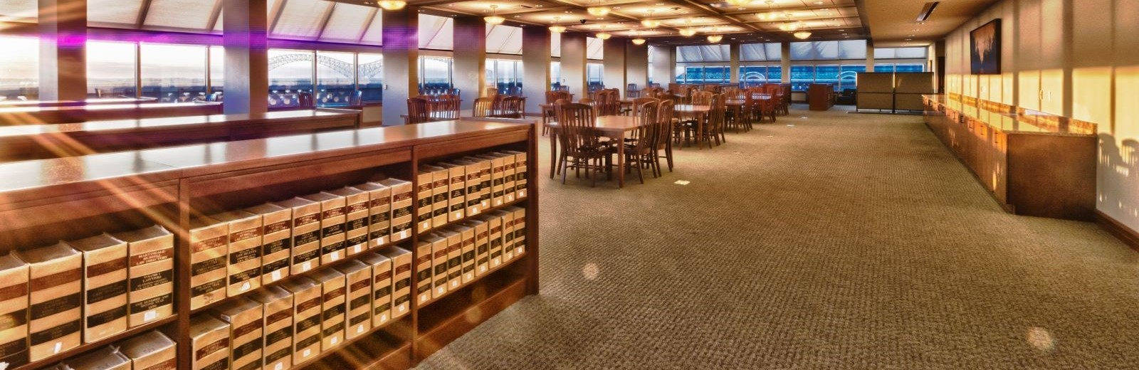 empty library with sunlight streaming in
