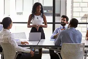 student presenting in a group setting