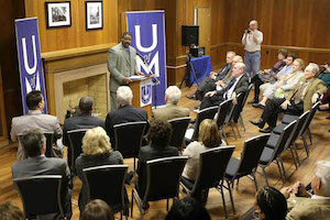 criminal justice representative leading executive meeting