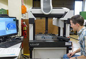 engineer working on computer in lab