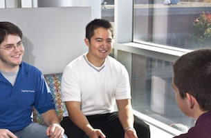 student smiling and talking