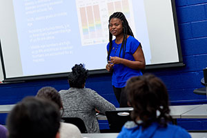 student talking to class