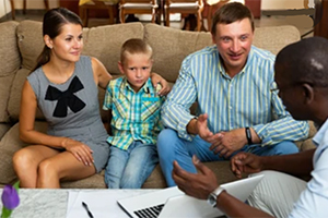 family talking to counselor